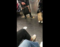 man in black leather jacket short shorts