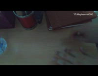 Guy makes beat on desk using pencil 