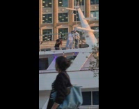 Two men rap video shoot on the docked yacht