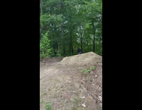 Biker falls off bike after jumping over ramp 