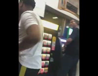 2 guys pretend to fight 