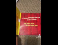 Girl finds old high school musical birthday card