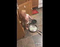 Collab VIBES - baby grabs toddler cabinet