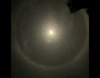 Night sky moon with huge halo around