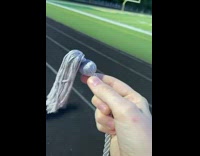 Grey graduation tassel looks like Ariana Grande 