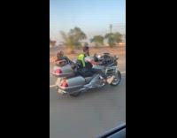 Guy drives cool motorbike in the highway