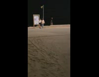 Two women tiktok dance beach bulletin board