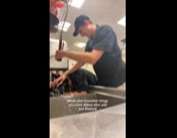 Man dips coworkers head on sink giving him more dishes