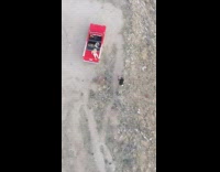 Filmer on hot air balloon red car pictorial