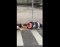 woman red hair floor feeding birds