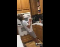 Kitchen kid plays dead falls backwards 