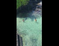 Guy in beach water practice some kicks
