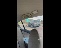 Man moves sign on a closed ramp 