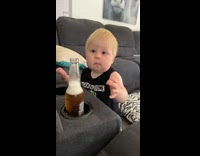 baby tries to grab beer told no and cries 