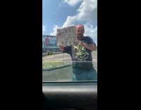 Guy on side of road asking for money not homeless