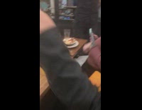 Group of women trying to eat brunch in heavy hail