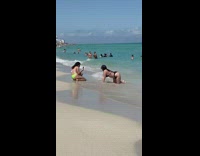 Girl black bikini bend over beach sunny