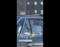 Old car with chandelier inside 