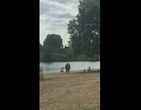 Two women balance top of other split mid-air