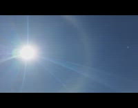 Sun with halo or rainbow around it