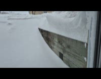 Submitter shows snow formed over wood fence
