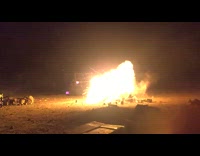 White propane tank flies towards guy