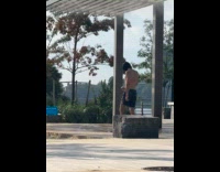 Collab WINY - Man wear black executioner mask at beach