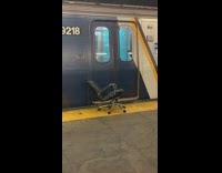 Black office chair left at train station