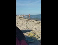 Woman black bikini continuous walk jump beach