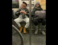 Collab Subway Creatures - Guy punches in the air next to unbothered woman on subway train