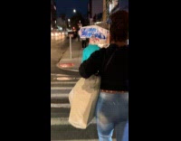 Collab WINY - Woman balances pack of tissue on head 