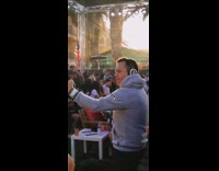 Guy records selfie drinking beer at Super bowl party