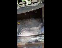 Guy opens spare tire compartment found pistol