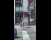 Woman yellow floral crop top photo shoot stop light