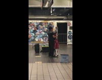 Man dances with a skeleton on subway