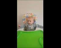 Baby gets excited on its toy airplane