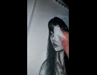 Girl drawing paper wipes away face demon