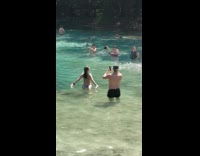 Woman in bikini over the shoulder look at the springs