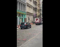 Guy does handstand push ups on railing 