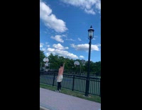 Man does trick shot outside court 