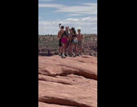 Shirtless guys and girls flex muscles cliff part 1