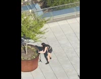 Girl films herself dancing using phone on tripod 