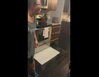 Little girl pushed by door when woman opens it 