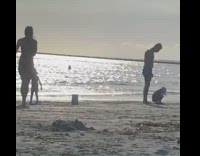 Woman dance young girl throw phone sand 