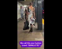 Man wear ripped apart plastic bags outfit