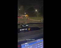 Motorcyclist does wheelie 