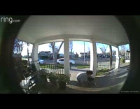Woman walks up front porch and falls