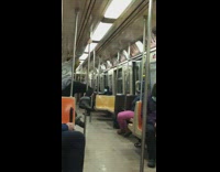 Guy wearing brown bear mask dances subway 