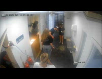 Man hits coffee and spilled to woman