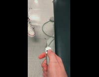 Girl red hair net water pick spray dentist